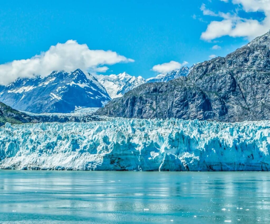 Close-up view of the massive blue ice walls of the Perito Moreno Glacier in El Calafate, a highlight of a Patagonia family vacation.